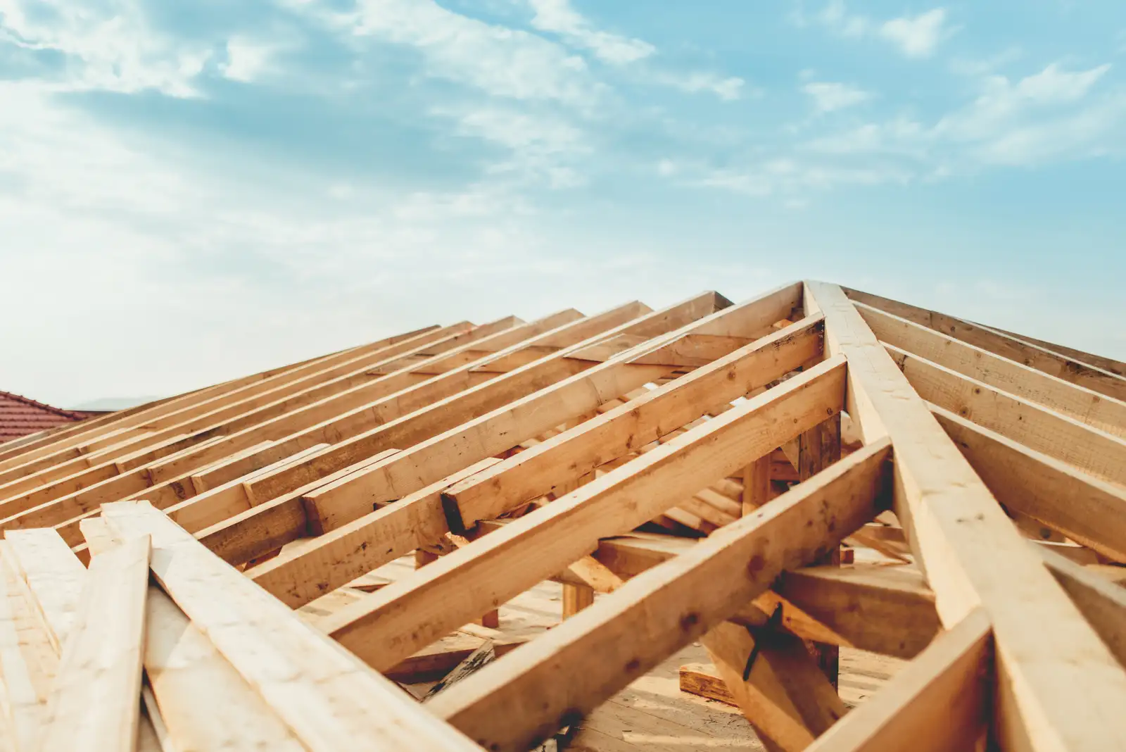 Timber roof frame of a house under construction